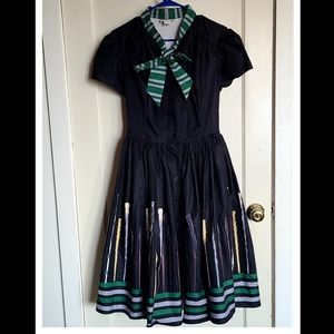 Adorable Harry Potter Slytherin 1950s style swing dress, from unique vintage.
